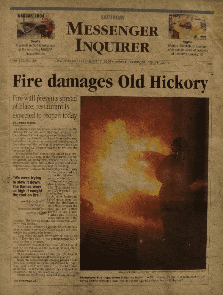 Newspaper showing Old Hickory fire with firefighters