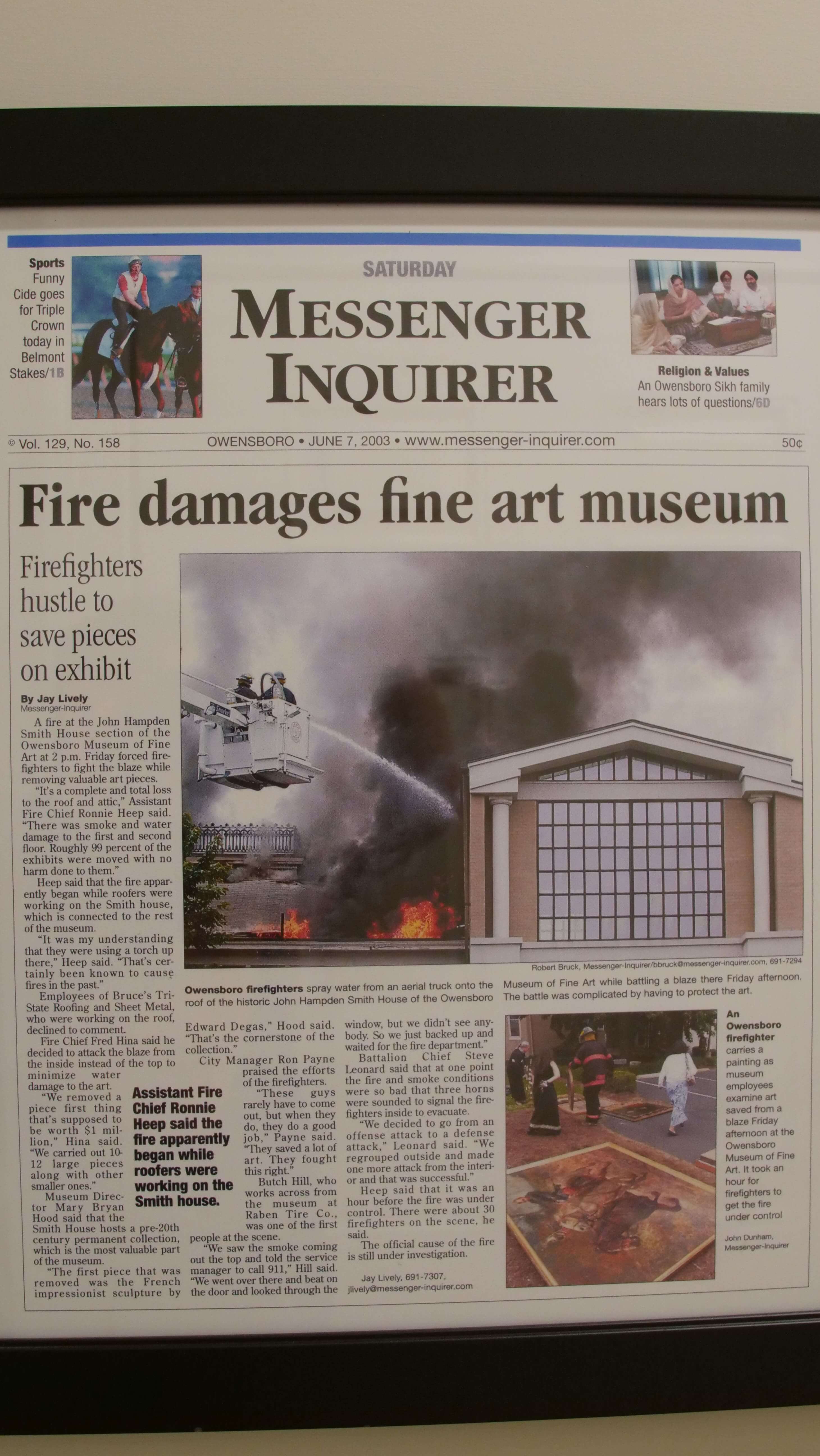 Newspaper showing museum damaged by fire
