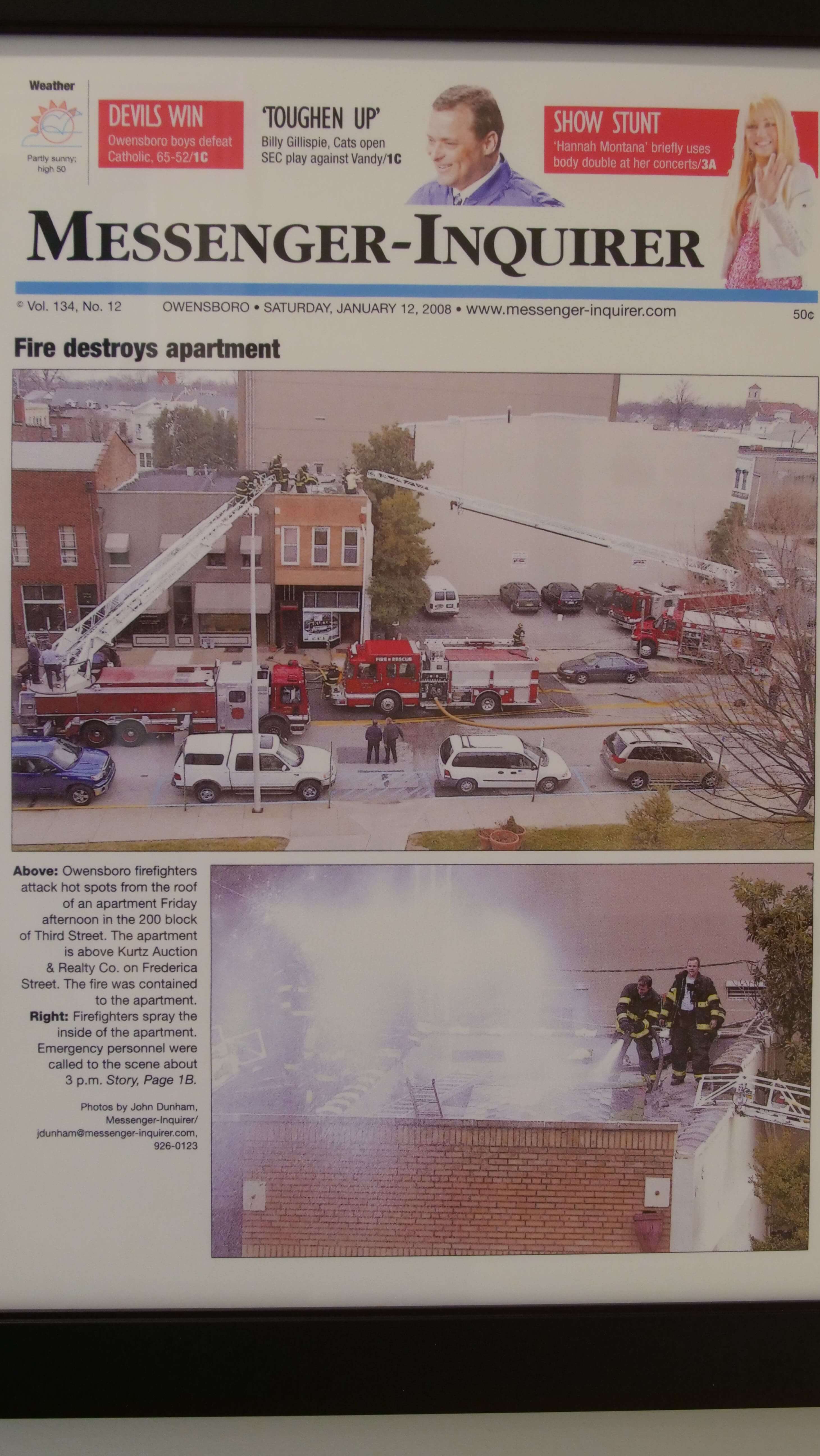 Newspaper showing apartment fire damage